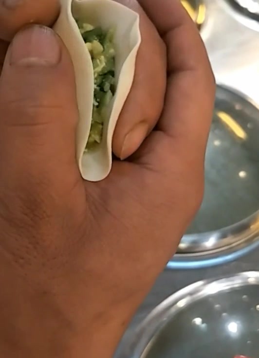 这是包饺子最快最简单的手法,几秒就包出一个,详细步骤都在这里
