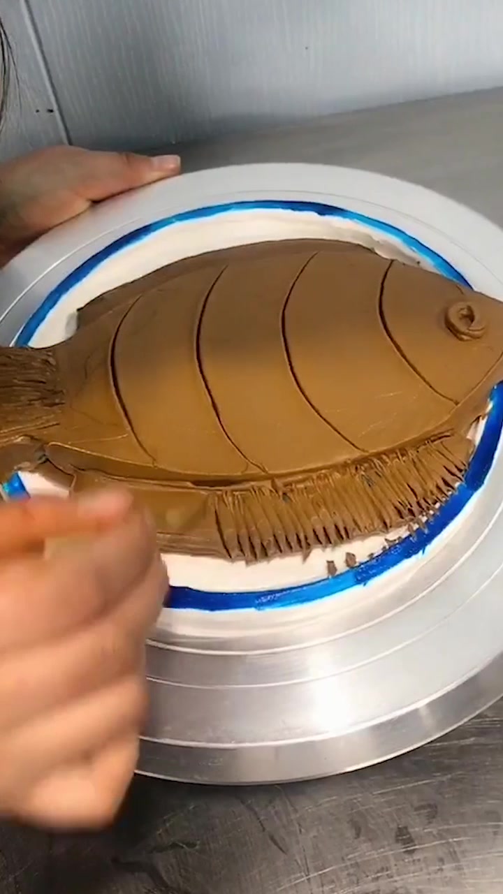 蛋糕师制作的年年有鱼蛋糕,看着就很精致哦