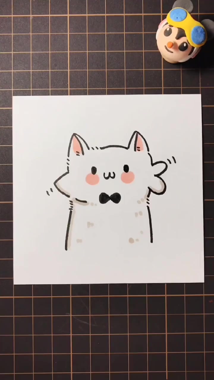 一只吃了鱼的小猫,不得不佩服作者的创意,真是太可爱了
