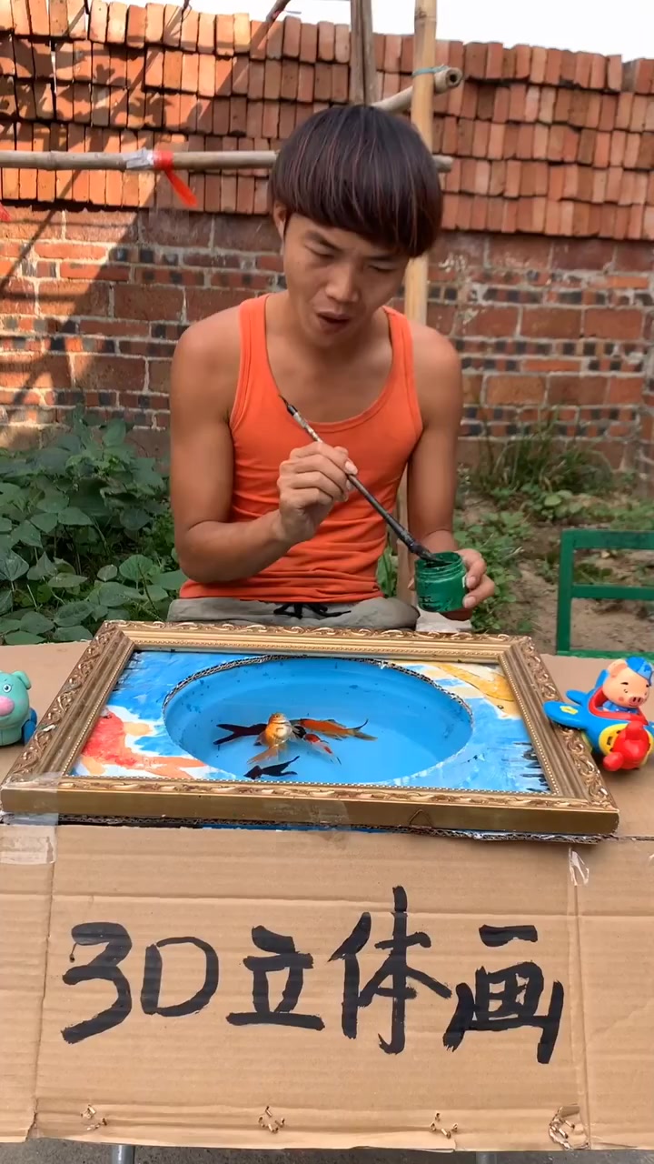 这金鱼画的真漂亮,好像真的