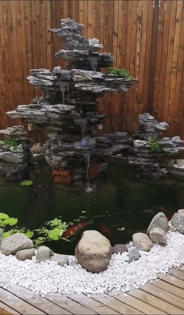 室内鱼池假山案例,鱼池一定要做过滤系统要不然过不久水就不行了