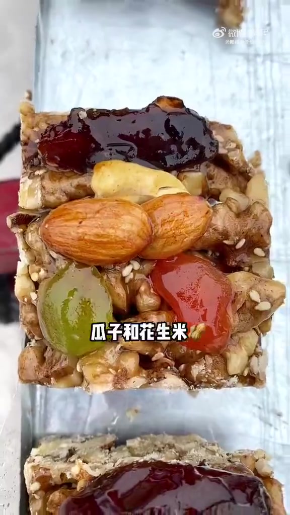 切糕是新疆地区的传统小吃,也叫玛仁糖。中国哪个省的酒席最好 冬季到新疆来滑雪 新疆美食  