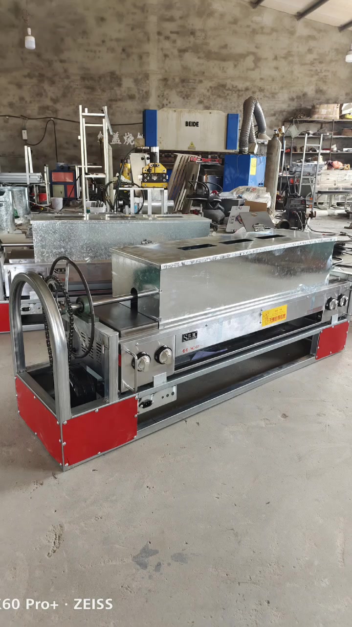 三轮车上放的红盖烧饼机