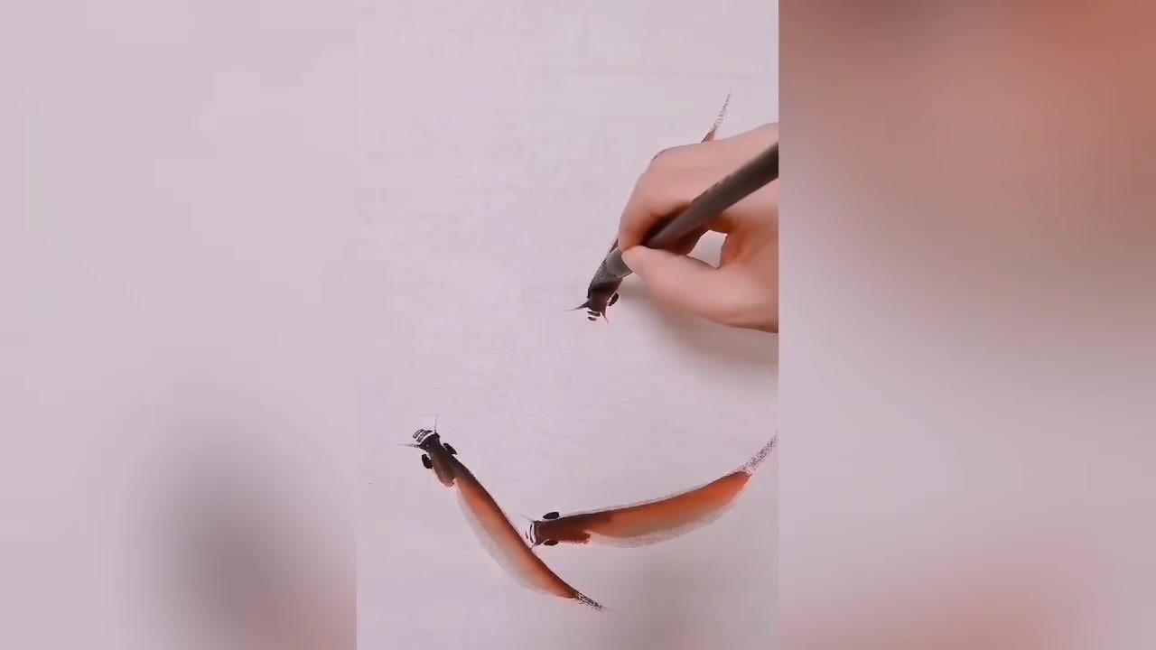 一群小鱼的画法演示