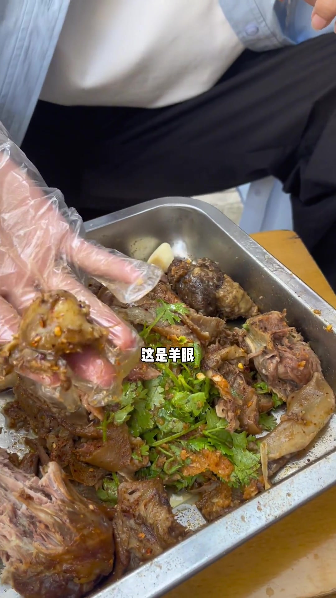 西小区丁记麻椒鸡的大羊头广告