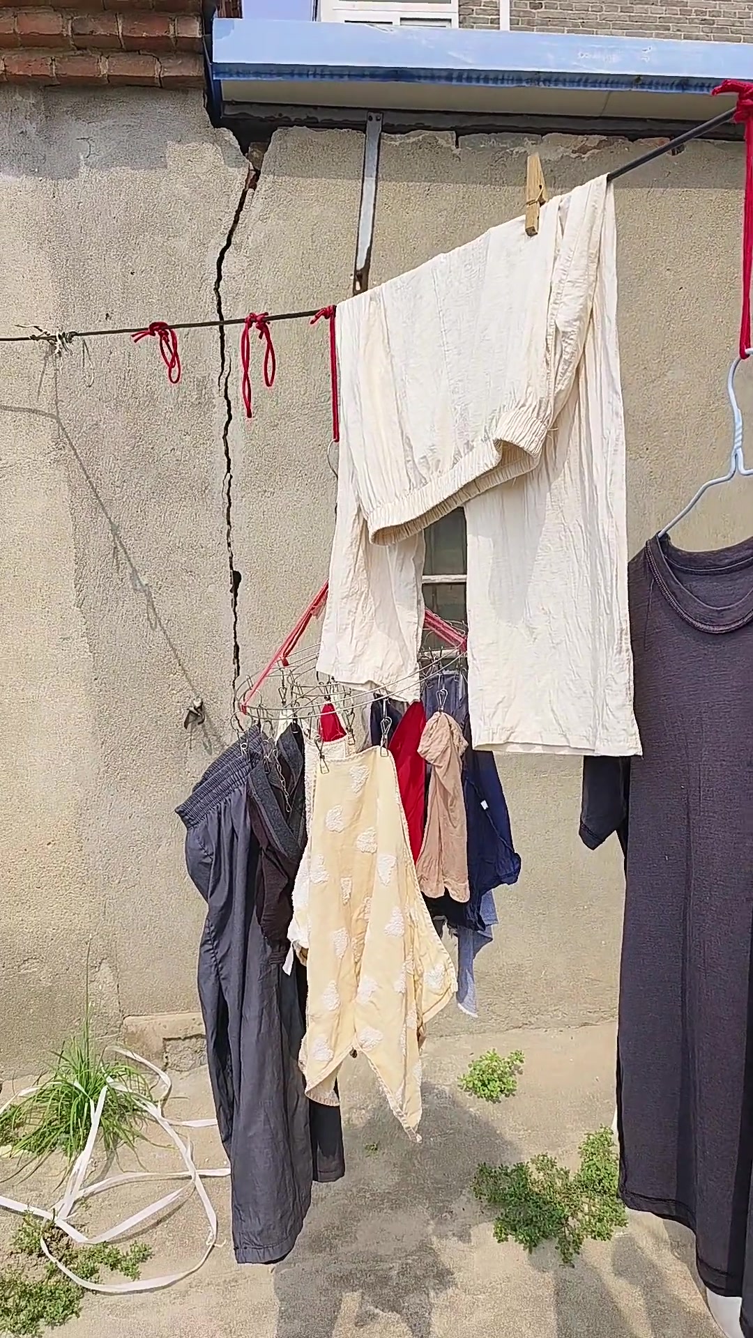 这衣服晾得怎么样?