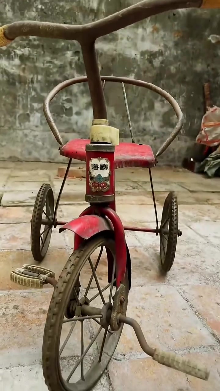 还记得三十年前的那辆三轮小童车吗